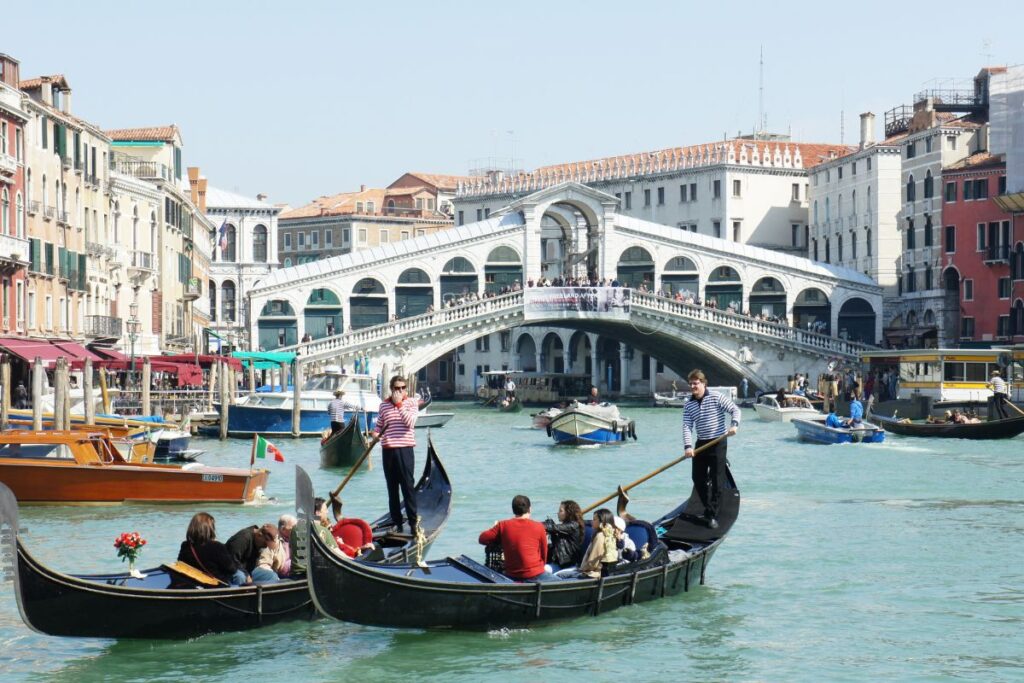 Gondola and the Rialto Bridge - Venice