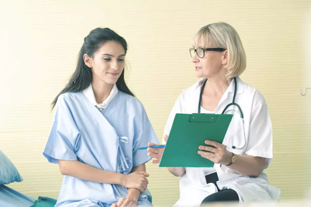 Doctor consulting a patient, discussing medical records and treatment options with care.